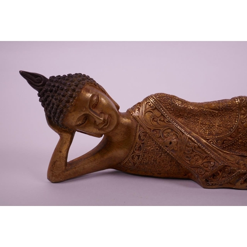 63 - A Thai gilt bronze of a reclining Buddha, 14