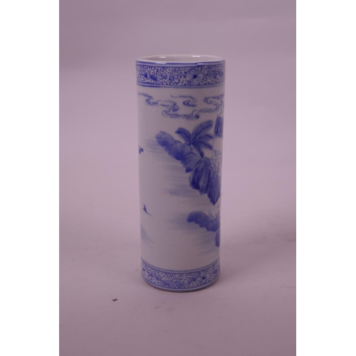 81 - A Chinese blue and white porcelain cylinder vase decorated with figures in a garden, leaf mark to ba... 