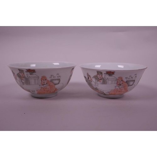 85 - A pair of Chinese porcelain rice bowls with red and black decoration of sages and their attendants, ... 