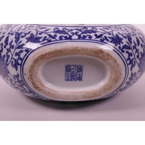 93 - A Chinese blue and white porcelain triple stem moon flask with two handles, decorated with a dragon ... 