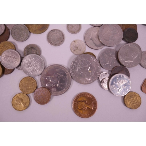 14 - A box of miscellaneous coins, mainly British and European, including a 1951 Festival of Britain crow... 