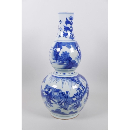 23 - A Chinese blue and white double gourd vase decorated with warriors and nobles in landscape scenes, 1... 