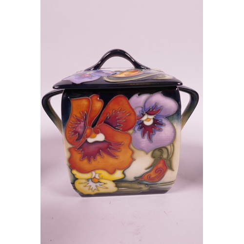 26 - A Moorcroft square section sucrier and cover, artist signed and numbered 54/150, 4½