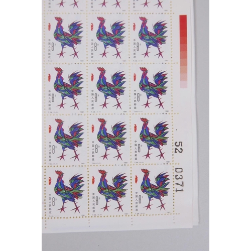 40 - A collection of six large facsimile (replica) Chinese perforated stamp sheets decorated with animals... 