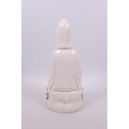 41 - A Chinese blanc de chine porcelain figure of Quan Yin, impressed marks verso, 10½