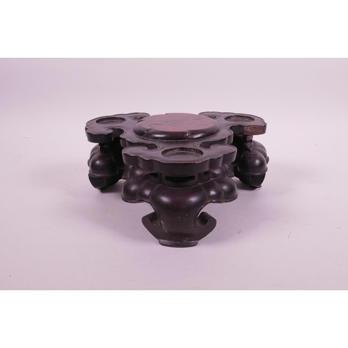 66 - An antique Chinese carved wood tripod censer stand, possibly zitan wood, A/F, losses, 8