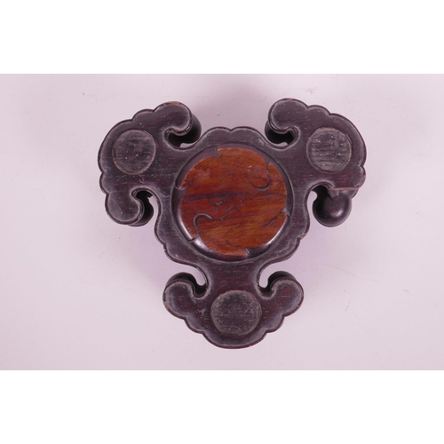 66 - An antique Chinese carved wood tripod censer stand, possibly zitan wood, A/F, losses, 8