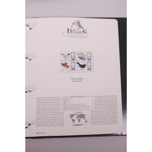 7 - An aviation heritage stamp collection album, and an album containing the 'Birds of the World' stamp ... 