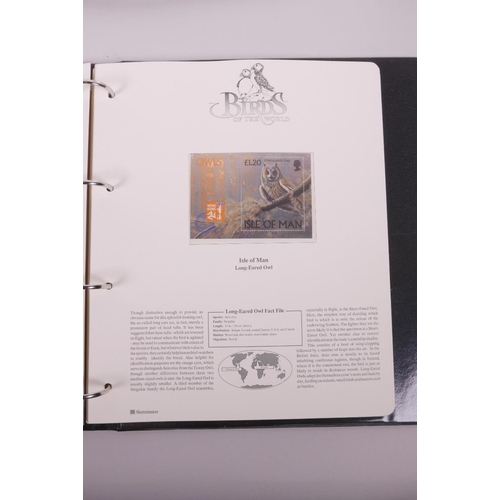 7 - An aviation heritage stamp collection album, and an album containing the 'Birds of the World' stamp ... 