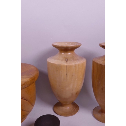 72 - A quantity of treen to include three turned vases, two small pots and covers and a Japanese rice bow... 