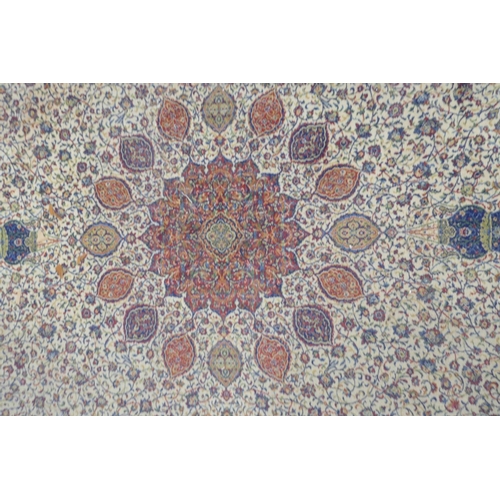 1205 - A large Persian pattern cream ground wool carpet, 143