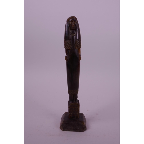 12 - A carved horn statue of an ancient Egyptian woman, 7