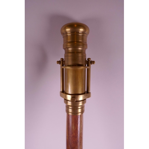 19 - A brass handled walking stick, the brass handle converting to a telescope, 38