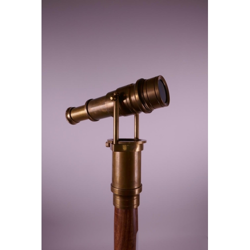 19 - A brass handled walking stick, the brass handle converting to a telescope, 38