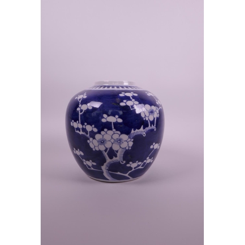 20 - A Chinese blue and white porcelain ginger jar with cracked ice and prunus blossom decoration, two co... 