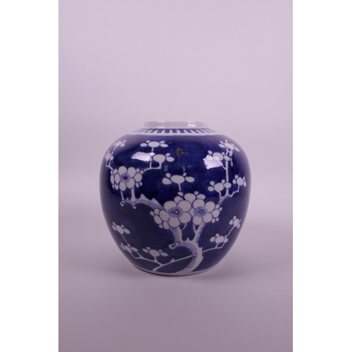 20 - A Chinese blue and white porcelain ginger jar with cracked ice and prunus blossom decoration, two co... 