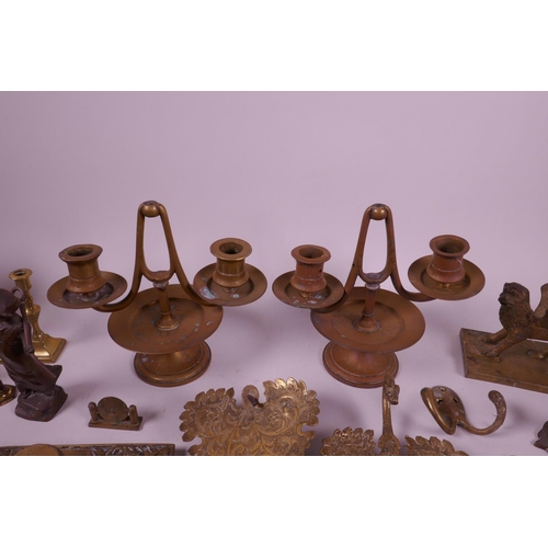 27 - A large collection of brass and copper decorative items to include candlesticks, ink pots, trinket d... 