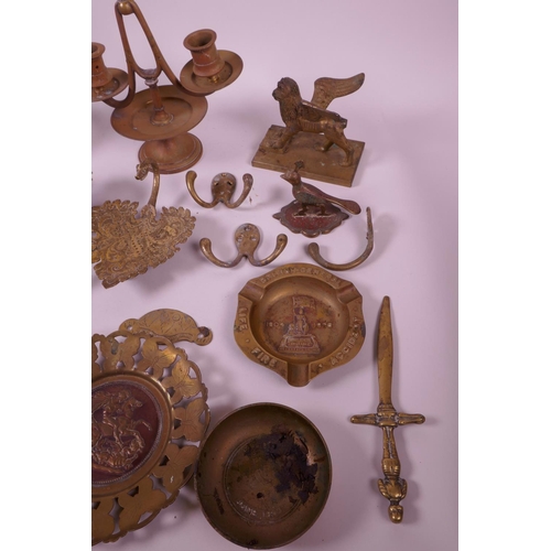 27 - A large collection of brass and copper decorative items to include candlesticks, ink pots, trinket d... 