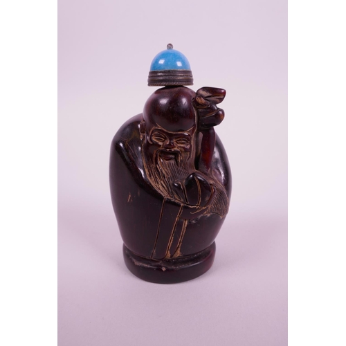 30 - A Chinese carved horn snuff bottle in the form of Shao Lao, 3