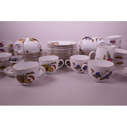 32 - A quantity of Royal Worcester Evesham pottery, including a part tea set and twelve ramekin dishes, c... 