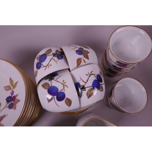 32 - A quantity of Royal Worcester Evesham pottery, including a part tea set and twelve ramekin dishes, c... 