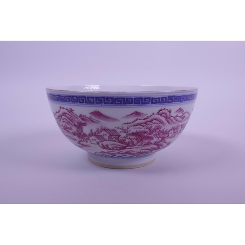 43 - A Chinese blue and white porcelain bowl decorated with a riverside landscape in puce enamels, seal m... 