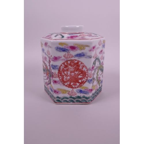 58 - A Chinese polychrome porcelain hexagonal tea caddy decorated with phoenix and dragon in enamels, sea... 