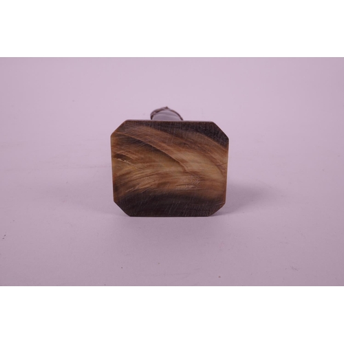 299 - A carved horn statue of an ancient Egyptian woman, 7