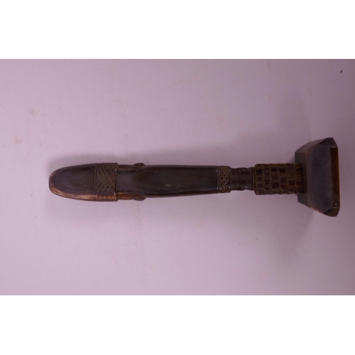 299 - A carved horn statue of an ancient Egyptian woman, 7