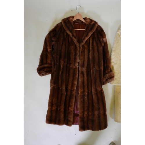 274 - A lady's three quarter length fur coat and another white fur coat