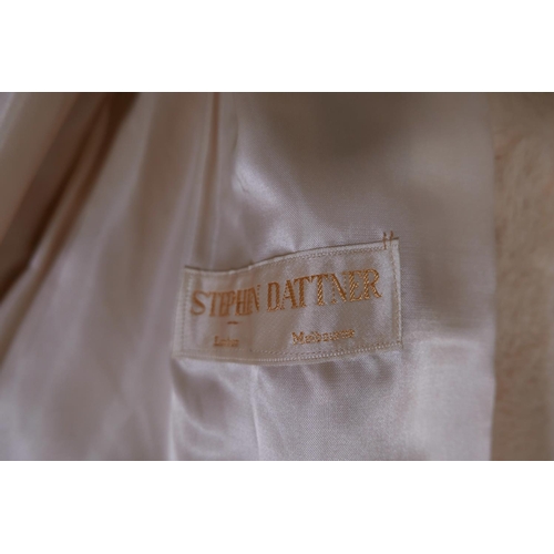 274 - A lady's three quarter length fur coat and another white fur coat