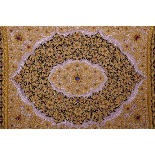 289 - A mid C20th Indian gilt thread wall hanging with floral decoration inset with hardstones, 24