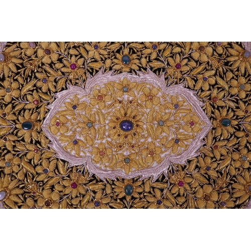 289 - A mid C20th Indian gilt thread wall hanging with floral decoration inset with hardstones, 24