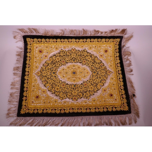 289 - A mid C20th Indian gilt thread wall hanging with floral decoration inset with hardstones, 24