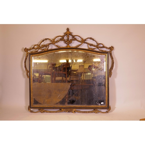 1177 - A contemporary wall mirror with pierced frame and ebonised and parcel gilt decoration, 57