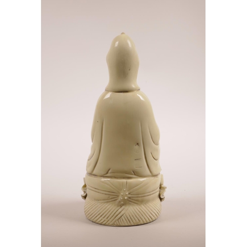 10 - A Chinese blanc de chine Quan Yin seated on a lotus throne, impressed marks verso, 10