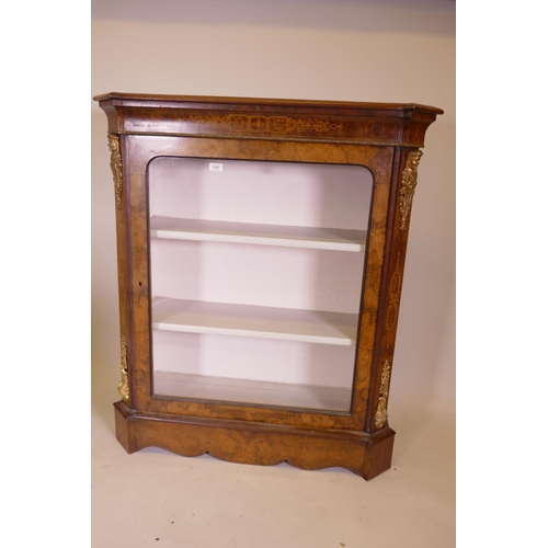 1167 - A C19th inlaid walnut pier cabinet with ormolu mounted canted corner and single glazed door on pedes... 