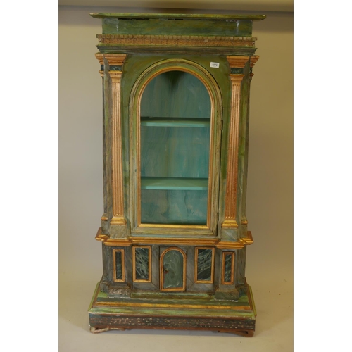 1169 - A Continental painted and parcel gilt display cabinet with single glazed door over a locking cupboar... 