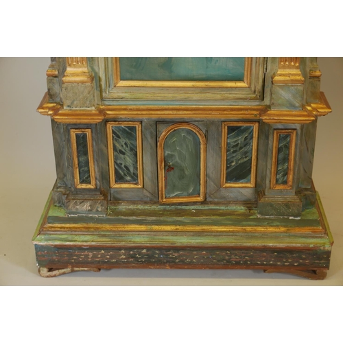 1169 - A Continental painted and parcel gilt display cabinet with single glazed door over a locking cupboar... 