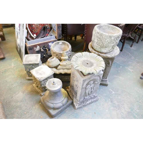 1175 - A quantity of reconstituted stone garden items including pedestals, planters, fountain parts etc