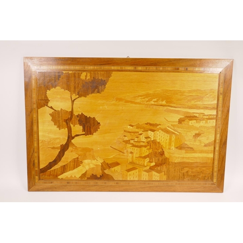 14 - A marquetry inlaid Sorrento wood panel depicting an Italian lakeside village, 23½