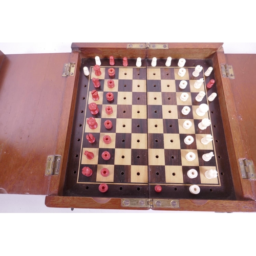 2 - A mahogany cased travelling chess set, playing board 7