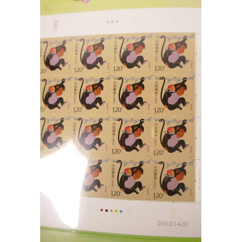 20 - A wallet of facsimile (replica) Chinese stamps commemorating 'The Auspicious Year of the Monkey', 9