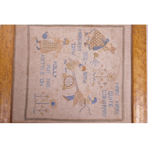 24 - A needlework sampler depicting children and nursery rhymes, later frame, 12