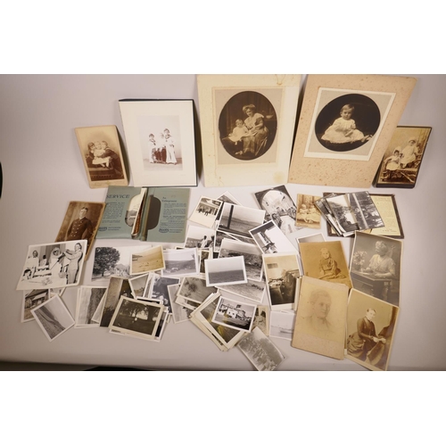 34 - A large quantity of early C20th photographs, mainly portraits and topographical scenes, approximatel... 