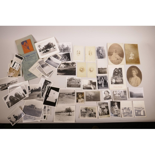 34 - A large quantity of early C20th photographs, mainly portraits and topographical scenes, approximatel... 