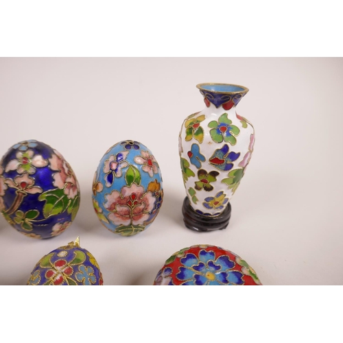 38 - A quantity of Chinese cloisonné to include two vases, two eggs, three pill boxes and a pig figurine,... 