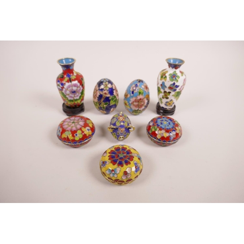 38 - A quantity of Chinese cloisonné to include two vases, two eggs, three pill boxes and a pig figurine,... 