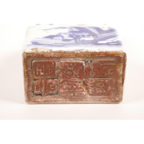 5 - A Chinese blue and white porcelain seal with a fo dog surmount and painted landscape scenes to side,... 