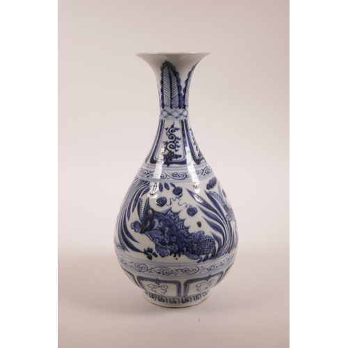 50 - A Chinese Ming style blue and white porcelain pear shaped vase with a flared rim, and carp decoratio... 